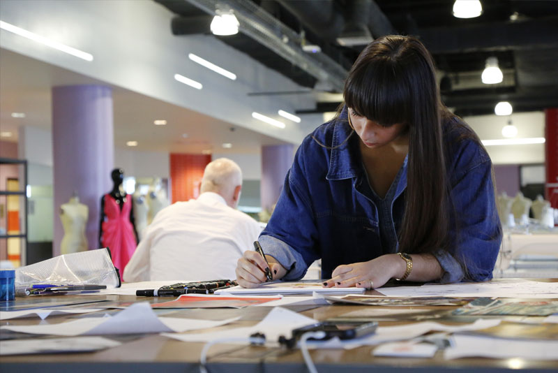 Student at a sewing class at MFI