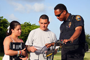 Public Safety officer talking to students