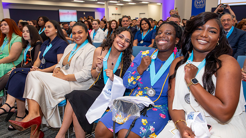 Members from the school of education at the pinning ceremony