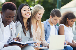 Multi-ethnic group of students on college campus