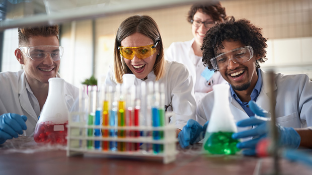 Students participate in a group chemistry lab experiment