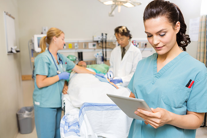 nursing students helping a patient